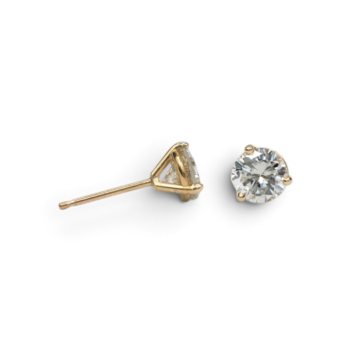 Stórica Studio 14k yellow gold stud earrings with 1ct total weight bezel-set diamonds in martini mountings.