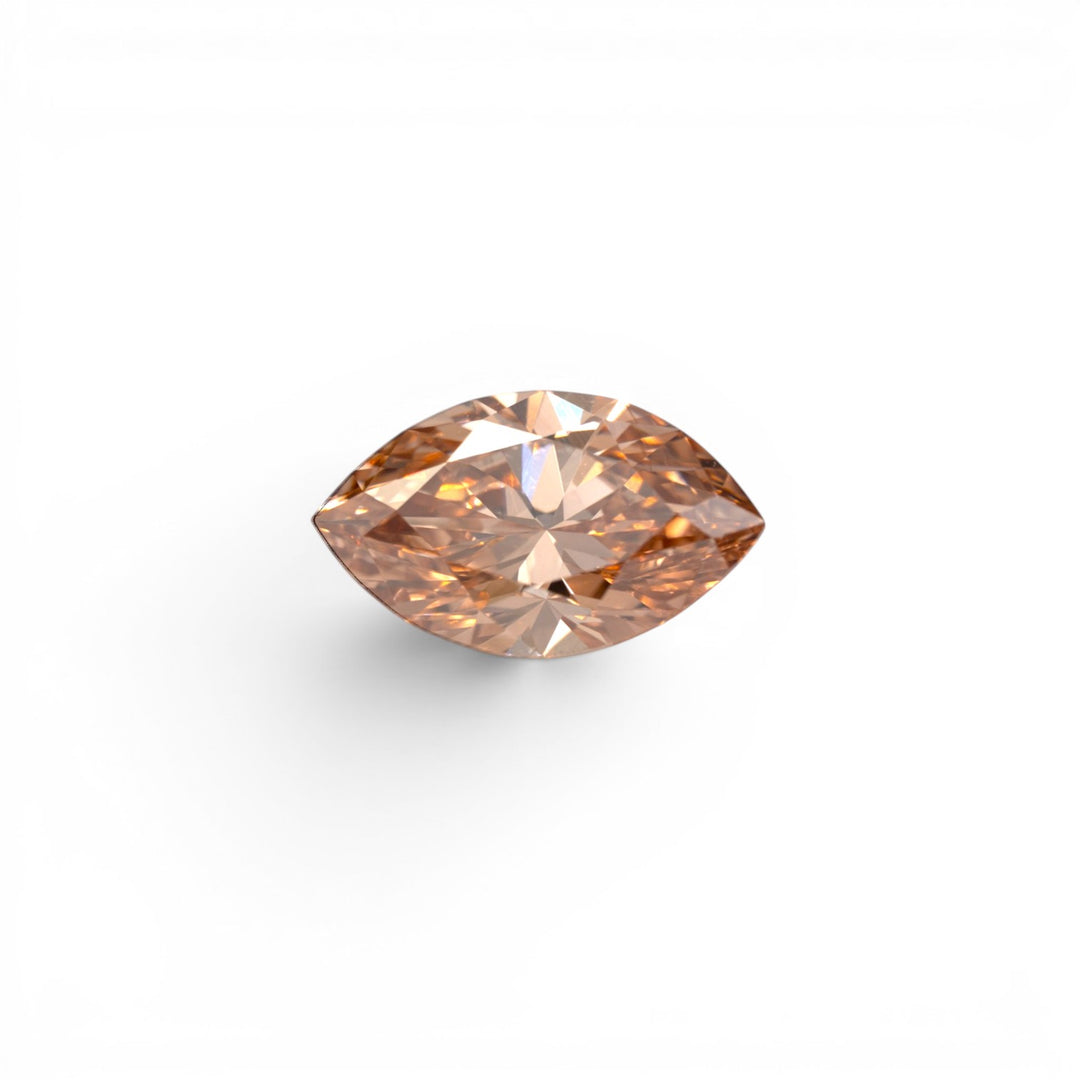 Stórica Studio - custom engagement rings in Seattle. 2.15ct marquise lab-grown diamond in deep champagne C5, VS1 clarity, with rich cognac-toned warmth, photographed loose on a white background.