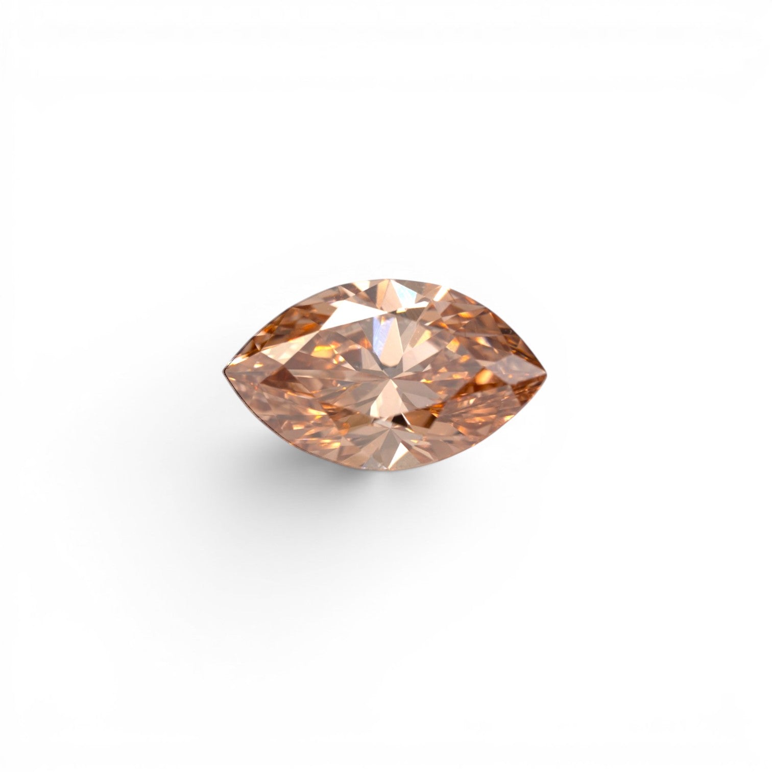 Stórica Studio - custom engagement rings in Seattle. 2.15ct marquise lab-grown diamond in deep champagne C5, VS1 clarity, with rich cognac-toned warmth, photographed loose on a white background.