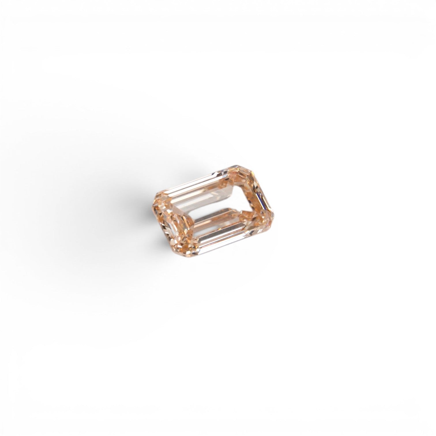 Stórica Studio 1.06ct champagne C2 emerald cut lab-grown diamond with VS1 clarity.