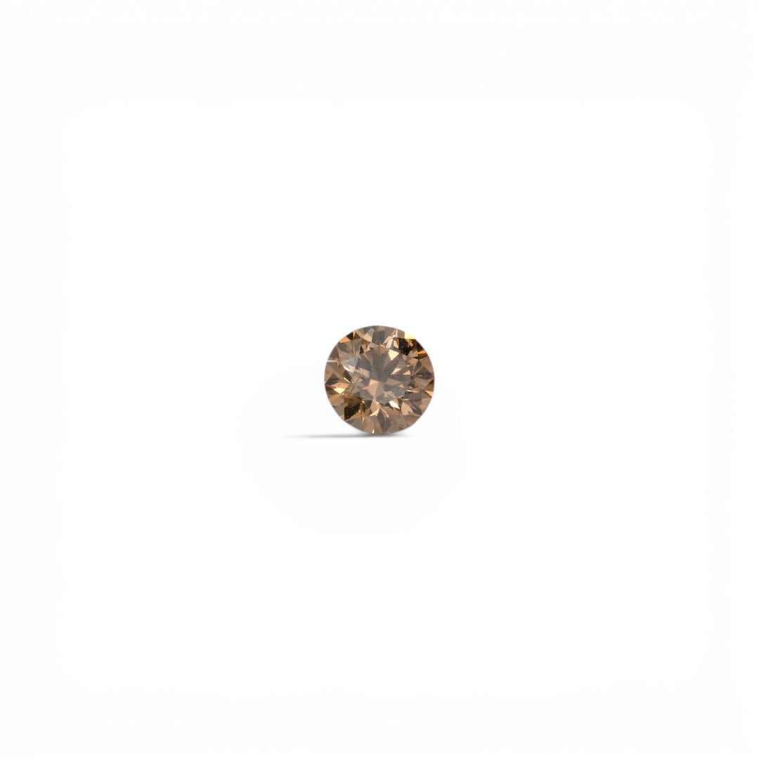 Stórica Studio .75ct round brilliant cognac diamond with post-consumer recycled origin.