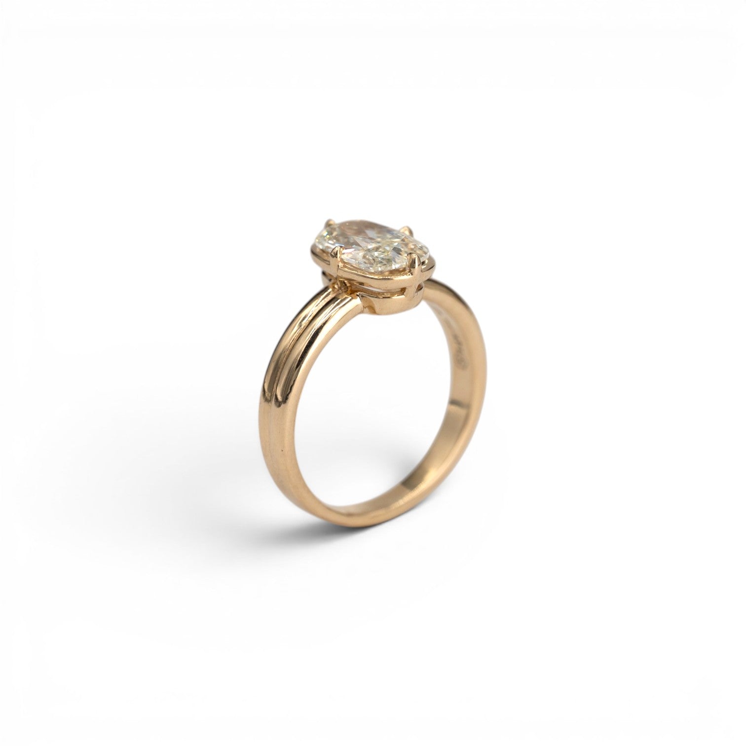 1.53ct earth-mined antique elongated cushion diamond in light yellow M color with compass prong setting in 14k yellow gold, by Stórica Studio - custom engagement rings in Seattle.