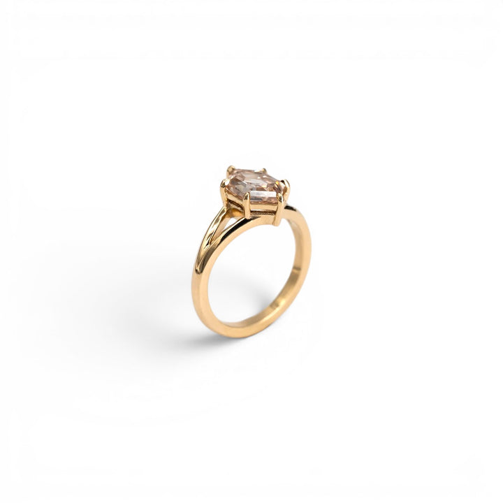 Stórica Studio 14k yellow gold ring featuring a 2.10ct hexagon champagne diamond with a split shank.