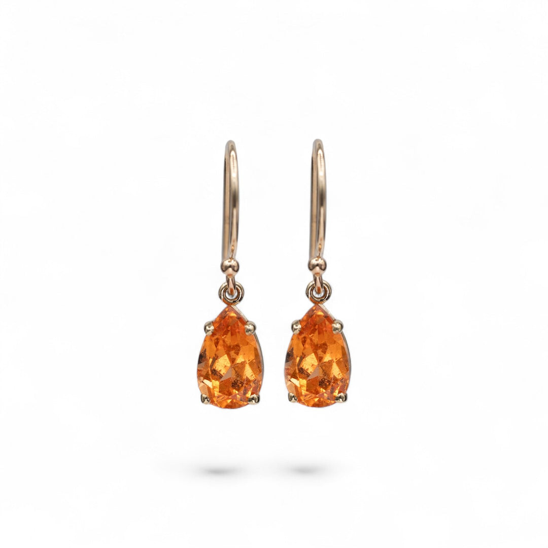]14k yellow gold French hook earrings with pear-shaped 2 carat total spessartite garnet drops in warm sunset orange